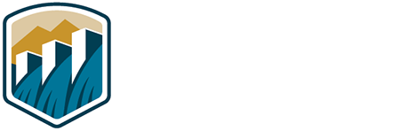 Bureau of Reclamation logo, A dam with water flowing over it.