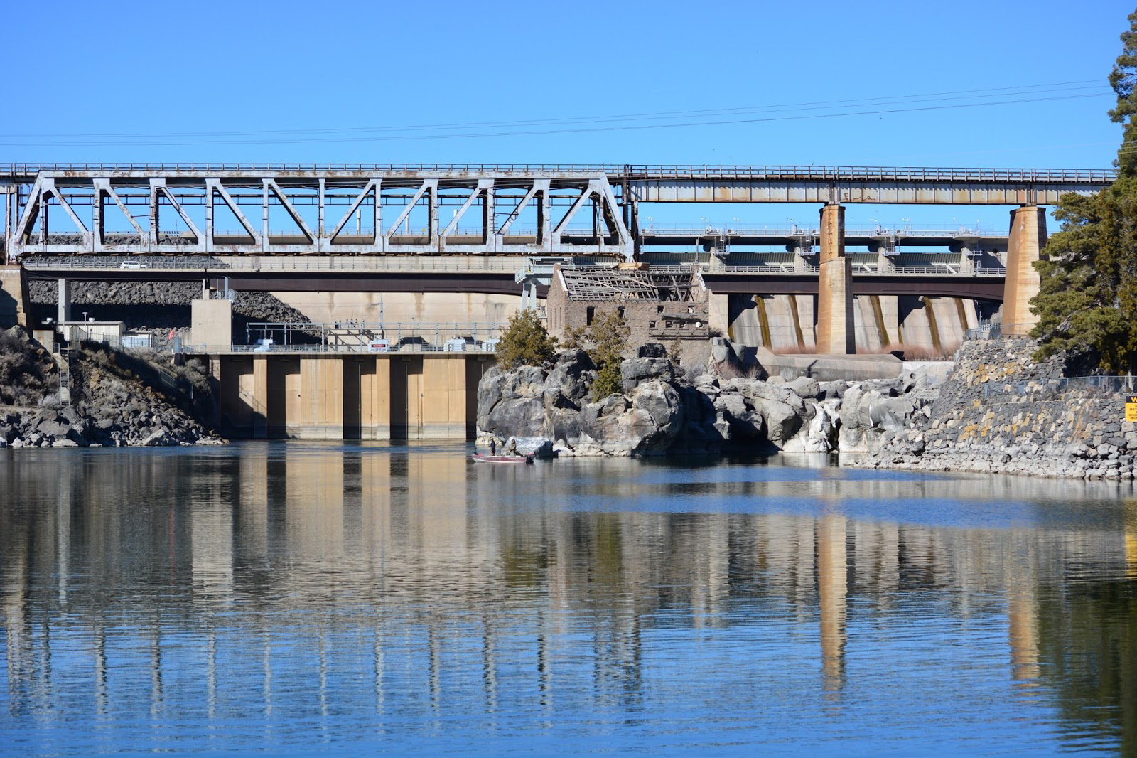 American Falls Dam, Power County, Idaho, viewed from downstream with spillway visible at right below the railroad bridge
