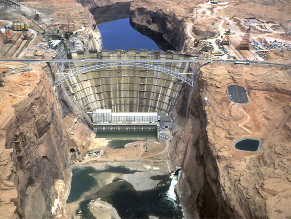 Aerial view of Glen Canyon Dam during construction - 1963