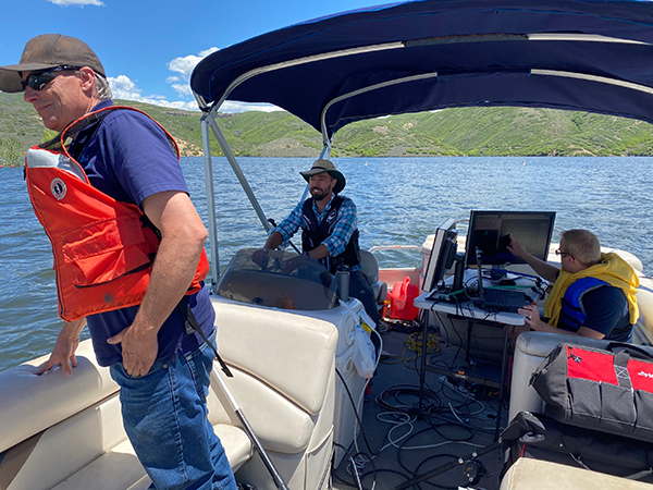 Left to Right: Rex Mathis (CUWCD), Josh Kresge (Reclamation), and Izaak Cooper (Brigham Young University Graduate Student) conducting a Bathymetric Survey of Jordanelle Reservoir, Utah.