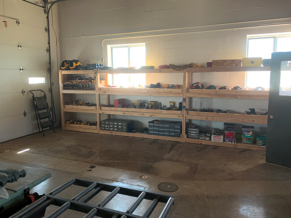 New shelving in the Carpenter Shop for storing and organizing tools and equipment.