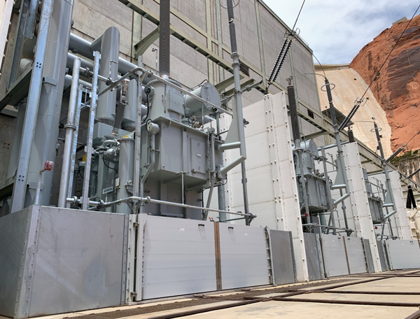 The K1A transformer bank on the transformer apron below the powerhouse at Glen Canyon Dam.