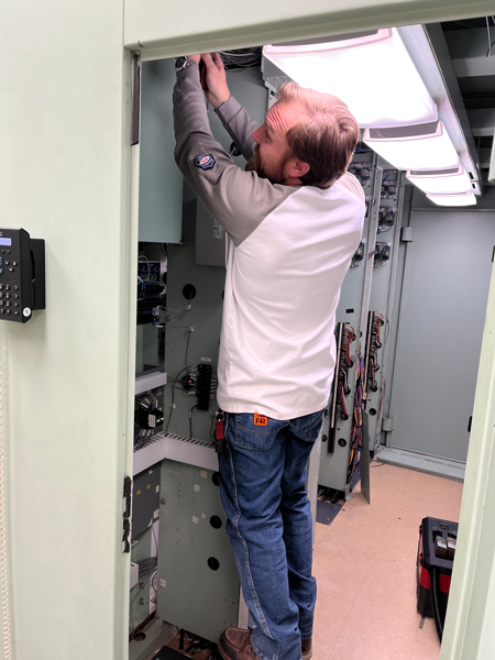 Matt Miller, Electrician working on the wiring
