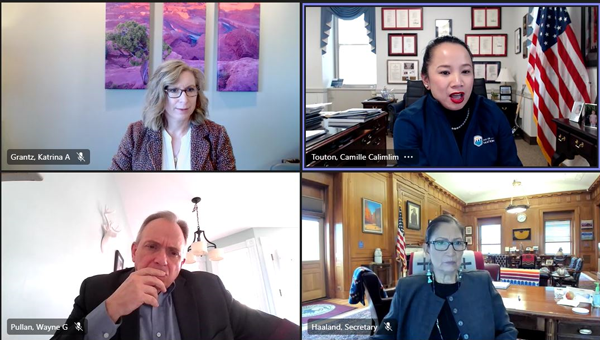 Screen grab of a virtual call showing from top left: Deputy Regional Director Katrina Grantz; Reclamation Commissioner Camille Calimlim Touton; from bottom left: Regional Director Wayne Pullan and Secretary of the Interior Deb Haaland.